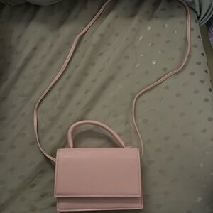 Pink cross body bag